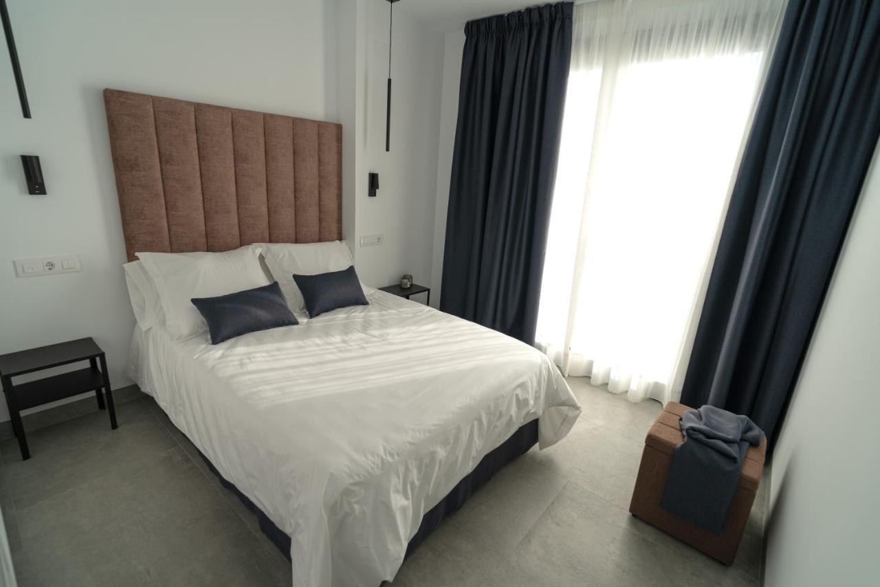Riam Suites Apartamentos Лос-Паласьос-и-Вильяфранка Экстерьер фото